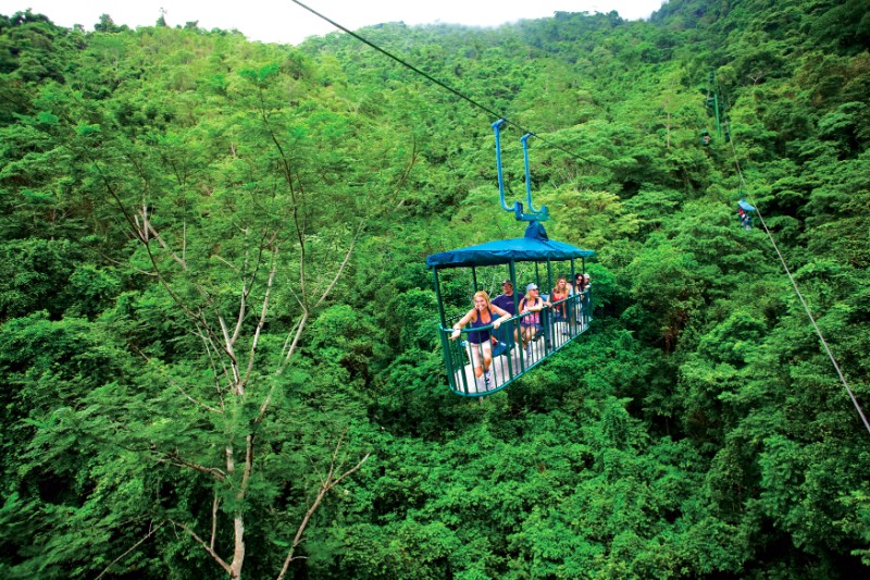 Aerial tram gliding over the Costa Rican rainforest canopy