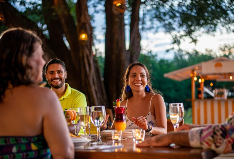 Guests enjoying a beachfront dinner in Costa Rica